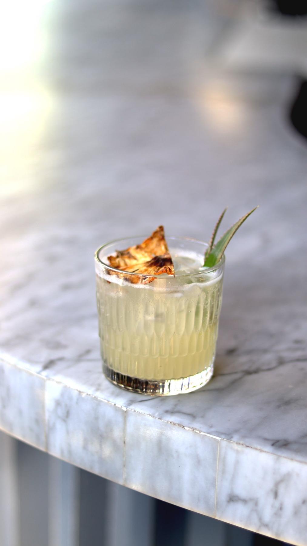 Bright citrus cocktail at Alchemy
